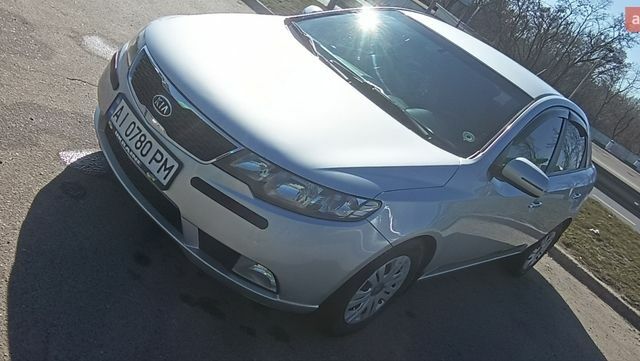 Серый Киа Черато, объемом двигателя 2 л и пробегом 271 тыс. км за 7500 $, фото 1 на Automoto.ua