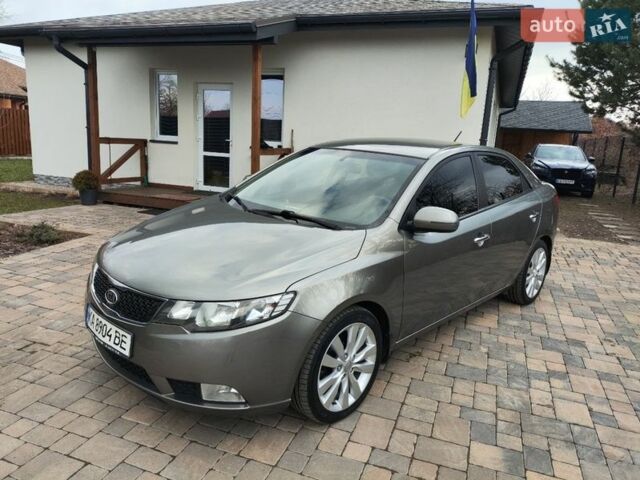 Сірий Кіа Черато, об'ємом двигуна 2 л та пробігом 136 тис. км за 9500 $, фото 1 на Automoto.ua