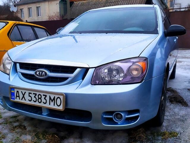 Синий Киа Черато, объемом двигателя 1.6 л и пробегом 320 тыс. км за 3800 $, фото 1 на Automoto.ua