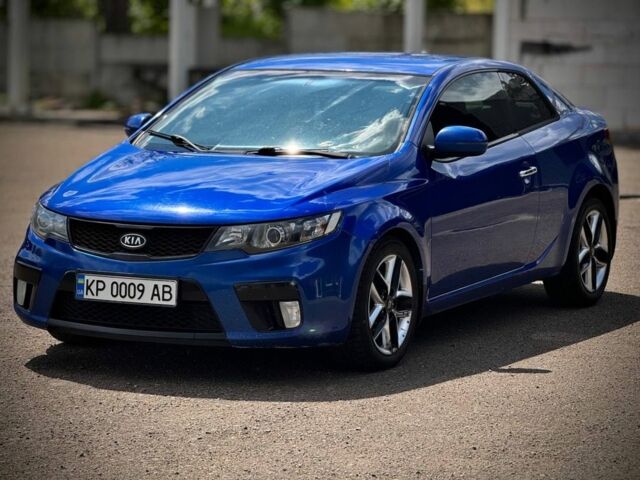 Синій Кіа Черато, об'ємом двигуна 2 л та пробігом 225 тис. км за 6400 $, фото 1 на Automoto.ua