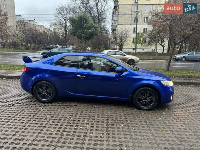 Синий Киа Черато, объемом двигателя 2 л и пробегом 190 тыс. км за 7000 $, фото 1 на Automoto.ua