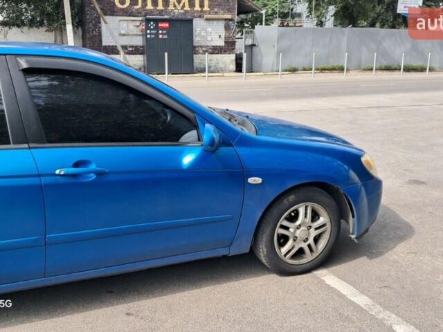 Синий Киа Черато, объемом двигателя 1.6 л и пробегом 280 тыс. км за 3500 $, фото 1 на Automoto.ua