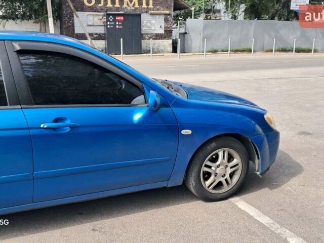 Синий Киа Черато, объемом двигателя 1.6 л и пробегом 280 тыс. км за 3500 $, фото 1 на Automoto.ua
