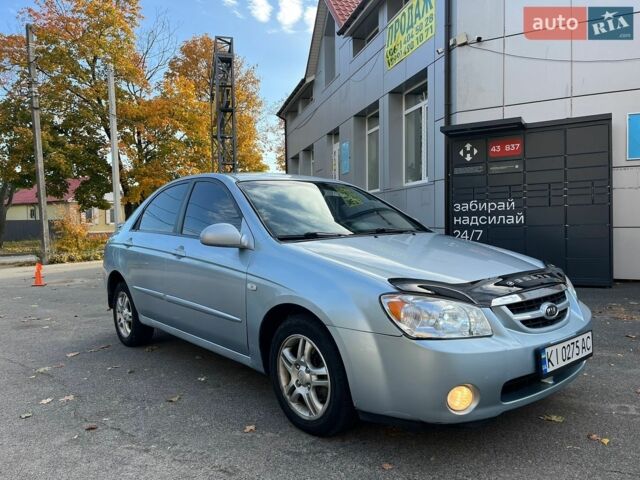 Синій Кіа Черато, об'ємом двигуна 2 л та пробігом 194 тис. км за 4200 $, фото 1 на Automoto.ua