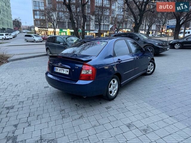Синий Киа Черато, объемом двигателя 1.6 л и пробегом 370 тыс. км за 3500 $, фото 1 на Automoto.ua