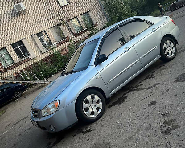 Синий Киа Черато, объемом двигателя 1.6 л и пробегом 370 тыс. км за 4600 $, фото 1 на Automoto.ua