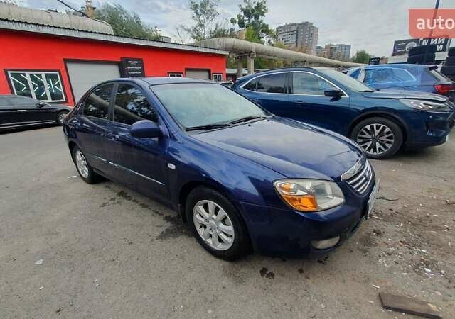 Синій Кіа Черато, об'ємом двигуна 2 л та пробігом 233 тис. км за 3900 $, фото 1 на Automoto.ua