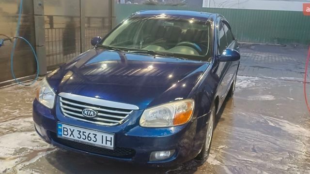 Синий Киа Черато, объемом двигателя 2 л и пробегом 300 тыс. км за 3800 $, фото 1 на Automoto.ua