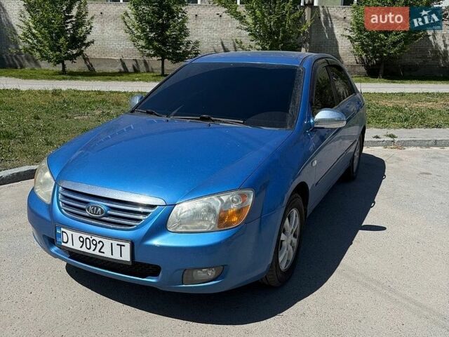 Синий Киа Черато, объемом двигателя 1.98 л и пробегом 227 тыс. км за 4500 $, фото 1 на Automoto.ua