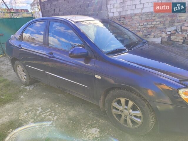 Синій Кіа Черато, об'ємом двигуна 2 л та пробігом 200 тис. км за 4600 $, фото 1 на Automoto.ua
