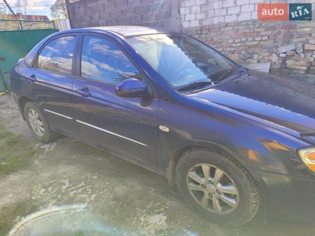Синій Кіа Черато, об'ємом двигуна 2 л та пробігом 200 тис. км за 4600 $, фото 1 на Automoto.ua