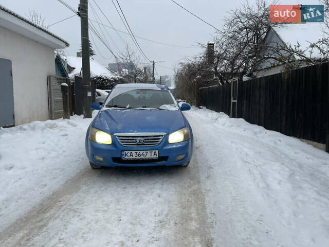 Синий Киа Черато, объемом двигателя 1.59 л и пробегом 230 тыс. км за 3200 $, фото 1 на Automoto.ua