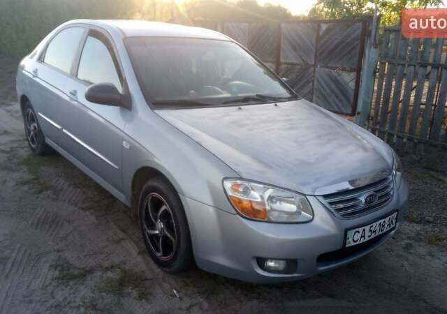 Синий Киа Черато, объемом двигателя 1.6 л и пробегом 250 тыс. км за 4500 $, фото 1 на Automoto.ua