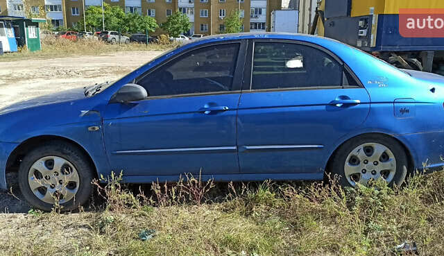 Синий Киа Черато, объемом двигателя 1.6 л и пробегом 220 тыс. км за 1350 $, фото 1 на Automoto.ua