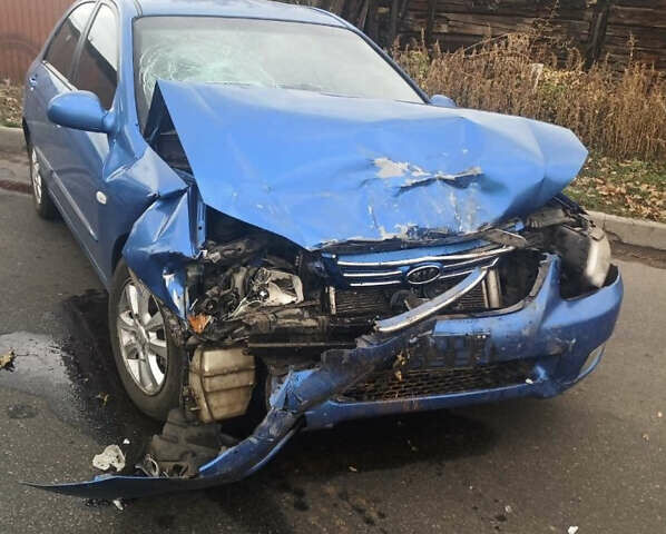 Синий Киа Черато, объемом двигателя 1.6 л и пробегом 140 тыс. км за 1400 $, фото 1 на Automoto.ua