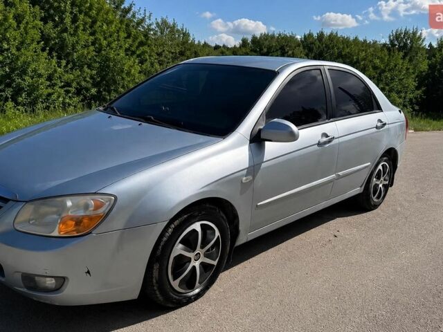 Синій Кіа Черато, об'ємом двигуна 1.6 л та пробігом 287 тис. км за 4500 $, фото 1 на Automoto.ua