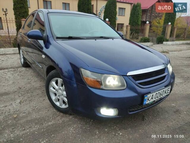 Синий Киа Черато, объемом двигателя 1.98 л и пробегом 246 тыс. км за 4400 $, фото 1 на Automoto.ua