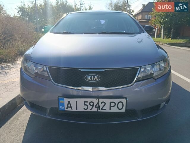 Синий Киа Черато, объемом двигателя 2 л и пробегом 241 тыс. км за 5400 $, фото 1 на Automoto.ua