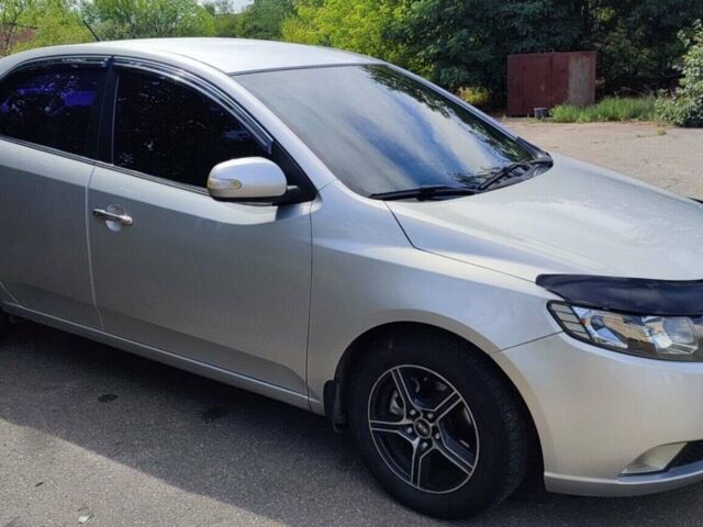 Синий Киа Черато, объемом двигателя 1.6 л и пробегом 243 тыс. км за 7000 $, фото 1 на Automoto.ua