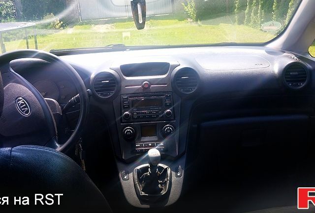 Чорний Кіа Церес, об'ємом двигуна 2 л та пробігом 245 тис. км за 5200 $, фото 1 на Automoto.ua