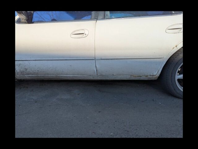 Білий Кіа Кларус, об'ємом двигуна 2 л та пробігом 257 тис. км за 1200 $, фото 1 на Automoto.ua