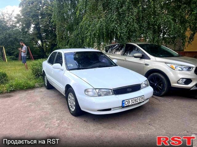 Білий Кіа Кларус, об'ємом двигуна 2 л та пробігом 274 тис. км за 1999 $, фото 1 на Automoto.ua