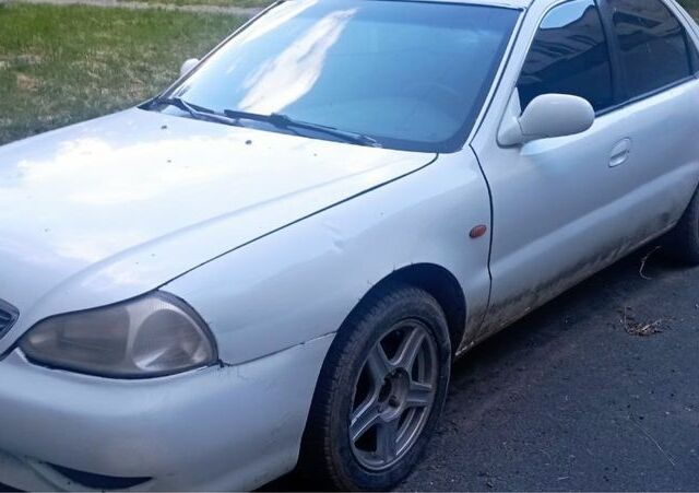 Белый Киа Кларус, объемом двигателя 1.8 л и пробегом 182 тыс. км за 730 $, фото 1 на Automoto.ua