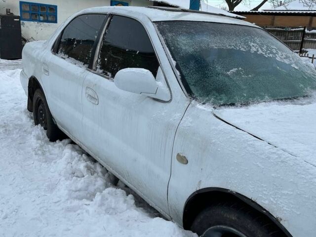 Білий Кіа Кларус, об'ємом двигуна 1.8 л та пробігом 666 тис. км за 737 $, фото 1 на Automoto.ua