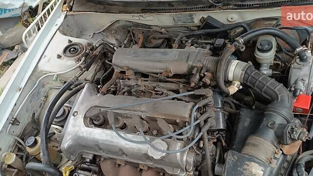 Белый Киа Кларус, объемом двигателя 1.8 л и пробегом 240 тыс. км за 427 $, фото 1 на Automoto.ua