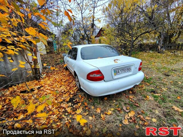 Белый Киа Кларус, объемом двигателя 2 л и пробегом 300 тыс. км за 1200 $, фото 1 на Automoto.ua