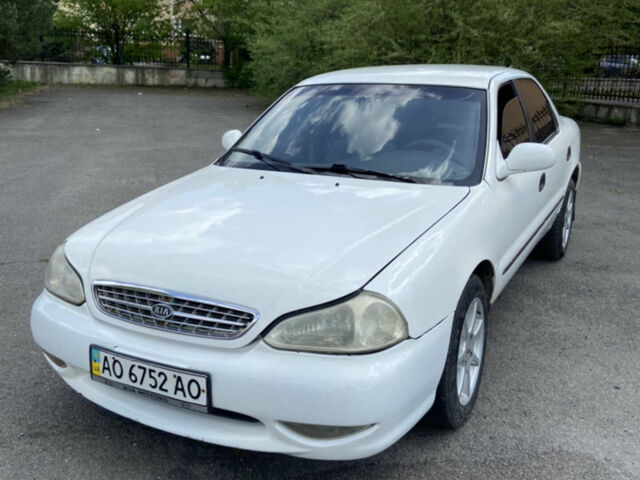 Білий Кіа Кларус, об'ємом двигуна 2 л та пробігом 270 тис. км за 1000 $, фото 1 на Automoto.ua