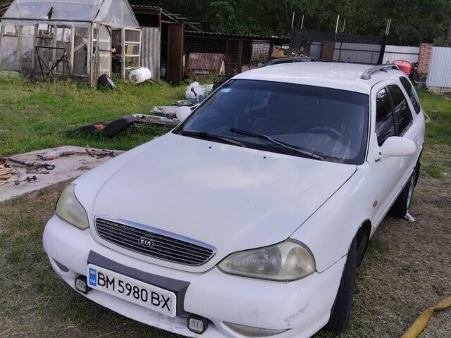 Белый Киа Кларус, объемом двигателя 2 л и пробегом 300 тыс. км за 809 $, фото 1 на Automoto.ua