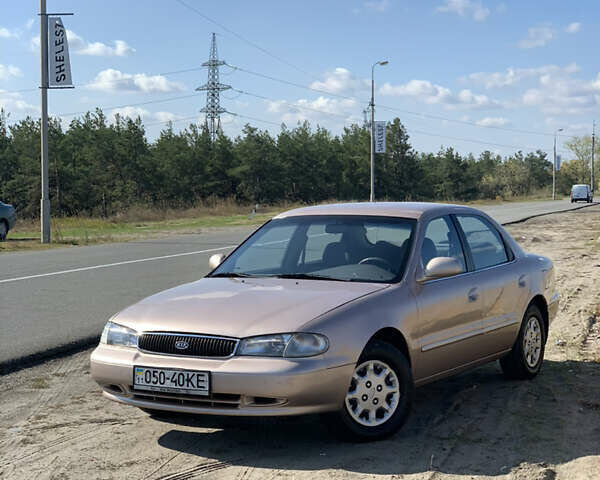 Бежевий Кіа Кларус, об'ємом двигуна 2 л та пробігом 101 тис. км за 3150 $, фото 1 на Automoto.ua
