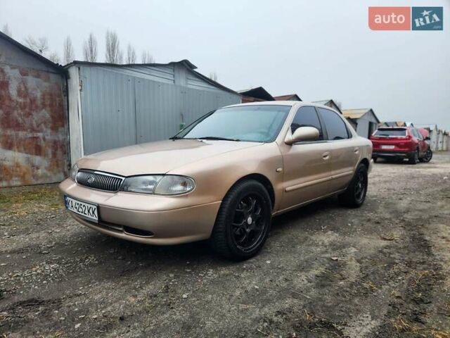 Бежевый Киа Кларус, объемом двигателя 2 л и пробегом 292 тыс. км за 2200 $, фото 1 на Automoto.ua