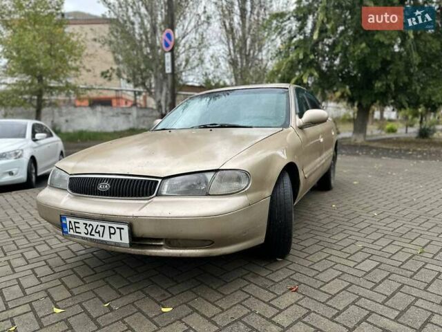 Бежевый Киа Кларус, объемом двигателя 2 л и пробегом 300 тыс. км за 1500 $, фото 1 на Automoto.ua