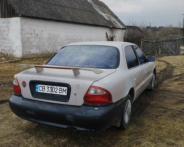 Бежевый Киа Кларус, объемом двигателя 2 л и пробегом 250 тыс. км за 2200 $, фото 1 на Automoto.ua