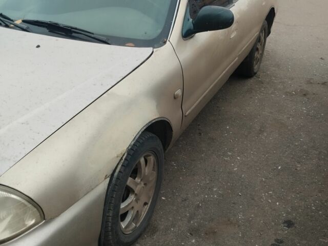 Бежевий Кіа Кларус, об'ємом двигуна 2 л та пробігом 360 тис. км за 1000 $, фото 1 на Automoto.ua