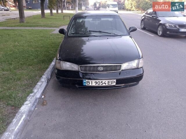 Чорний Кіа Кларус, об'ємом двигуна 2 л та пробігом 300 тис. км за 1254 $, фото 1 на Automoto.ua
