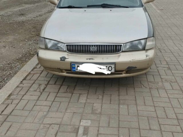 Коричневый Киа Кларус, объемом двигателя 2 л и пробегом 232 тыс. км за 1700 $, фото 1 на Automoto.ua