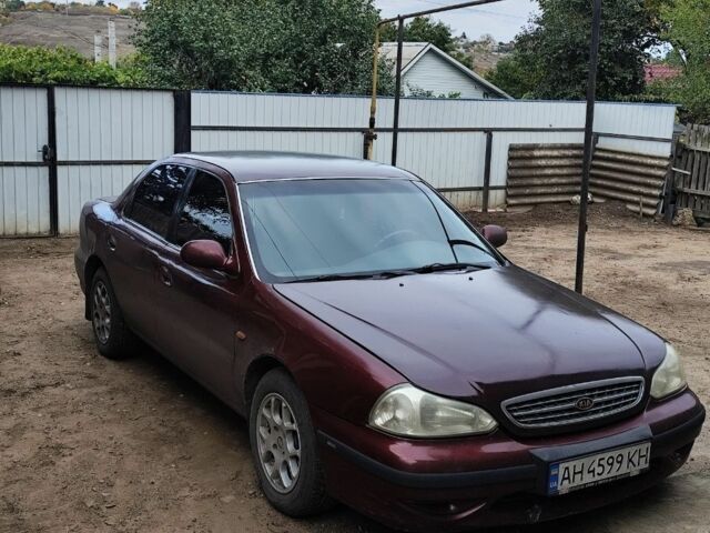 Красный Киа Кларус, объемом двигателя 2 л и пробегом 280 тыс. км за 1384 $, фото 1 на Automoto.ua