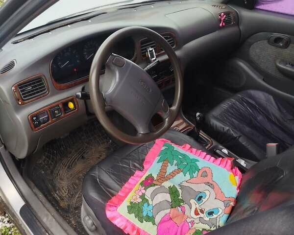 Сірий Кіа Кларус, об'ємом двигуна 1.79 л та пробігом 200 тис. км за 1800 $, фото 1 на Automoto.ua