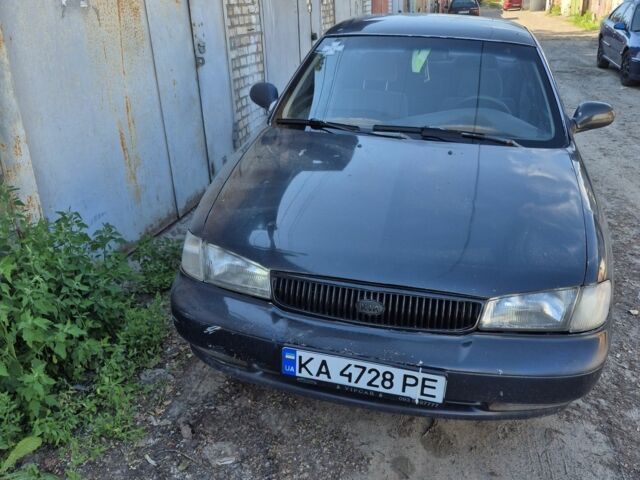 Серый Киа Кларус, объемом двигателя 2 л и пробегом 300 тыс. км за 895 $, фото 1 на Automoto.ua