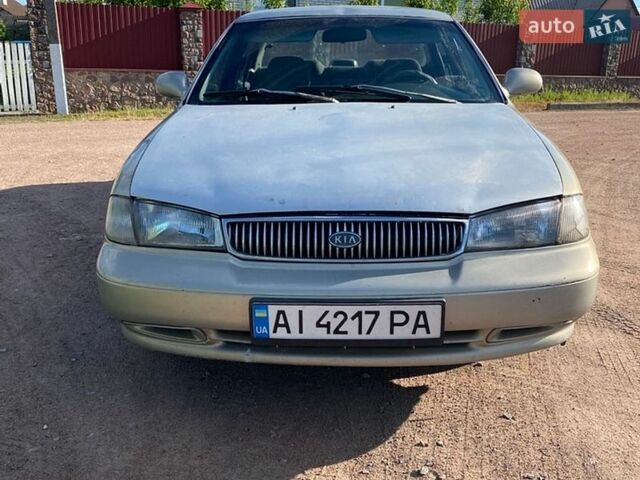 Серый Киа Кларус, объемом двигателя 2 л и пробегом 350 тыс. км за 2200 $, фото 1 на Automoto.ua