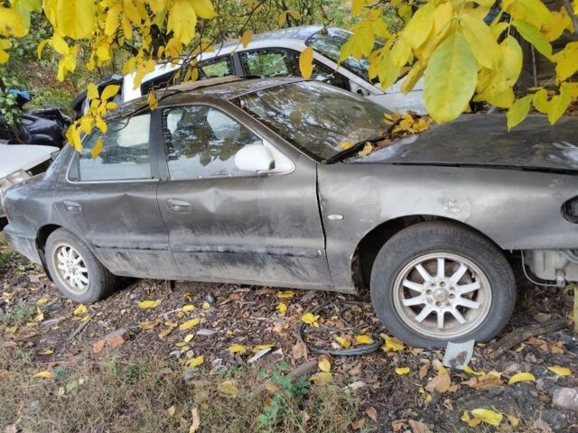 Сірий Кіа Кларус, об'ємом двигуна 2 л та пробігом 123 тис. км за 500 $, фото 1 на Automoto.ua