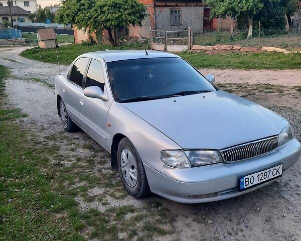 Серый Киа Кларус, объемом двигателя 2 л и пробегом 250 тыс. км за 2100 $, фото 1 на Automoto.ua