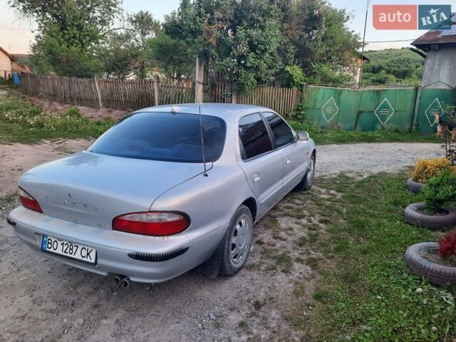 Сірий Кіа Кларус, об'ємом двигуна 2 л та пробігом 250 тис. км за 2100 $, фото 1 на Automoto.ua