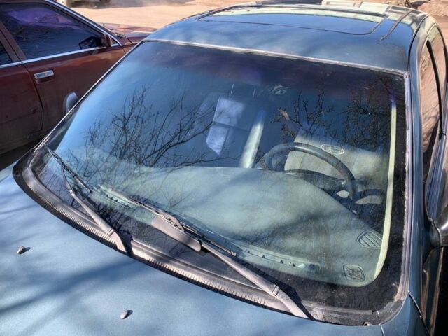 Серый Киа Кларус, объемом двигателя 2 л и пробегом 360 тыс. км за 1191 $, фото 1 на Automoto.ua