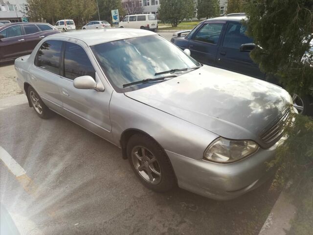 Сірий Кіа Кларус, об'ємом двигуна 2 л та пробігом 380 тис. км за 1600 $, фото 1 на Automoto.ua