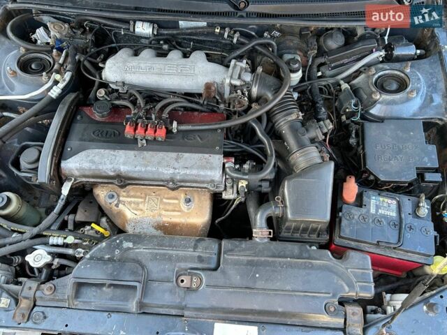 Сірий Кіа Кларус, об'ємом двигуна 2 л та пробігом 413 тис. км за 1680 $, фото 1 на Automoto.ua