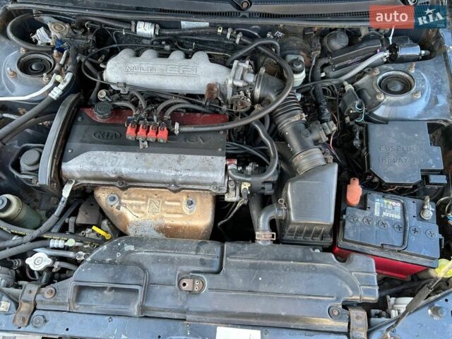 Сірий Кіа Кларус, об'ємом двигуна 2 л та пробігом 413 тис. км за 1680 $, фото 1 на Automoto.ua
